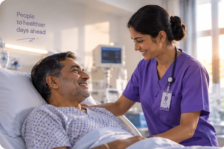 A nurse at the bedside of a patient in a hospital ward, the two of them talking.